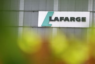 Image for French cement maker Lafarge found guilty of financing jihadists in Syria