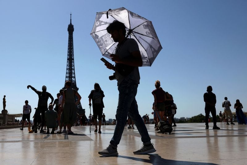 Image for France shuts schools as heatwave grips Europe, sea off Spain at record high temperatures