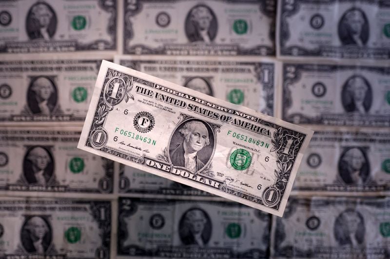 Image for US dollar hovers near 2026 highs as oil's rise spurs hawkish central bank bets