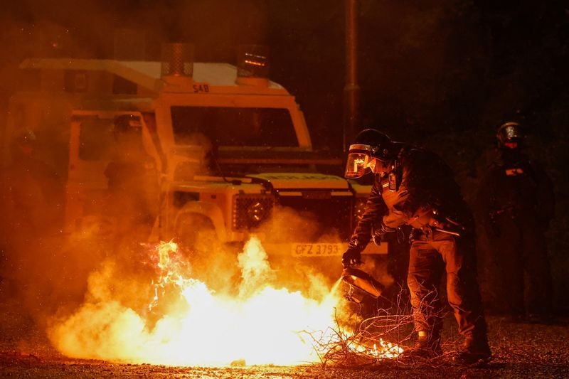 Image for Police attacked as Northern Irish violence spreads to another town