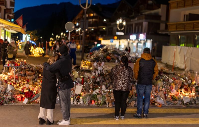 Image for Grieving parents protest at Swiss handling of autopsies for bar fire victims