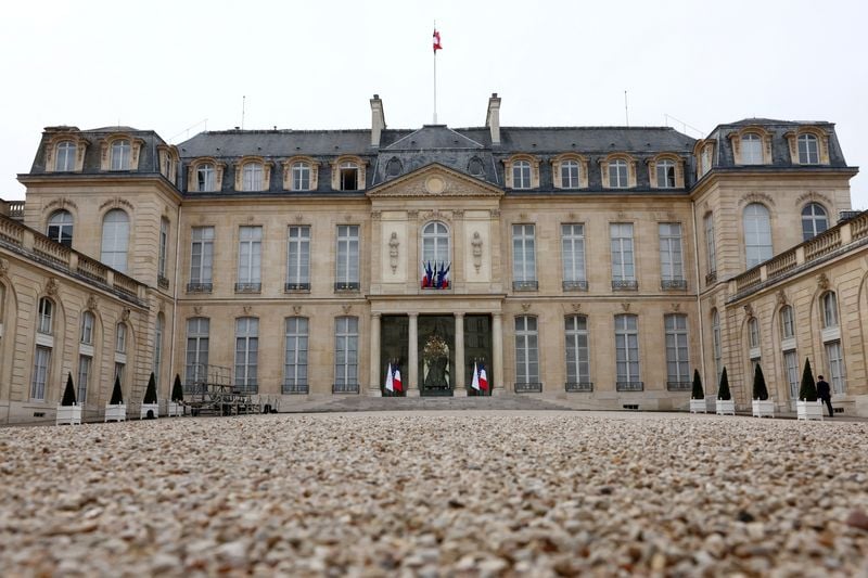 Image for French police search sites in corruption probe, Elysee access denied