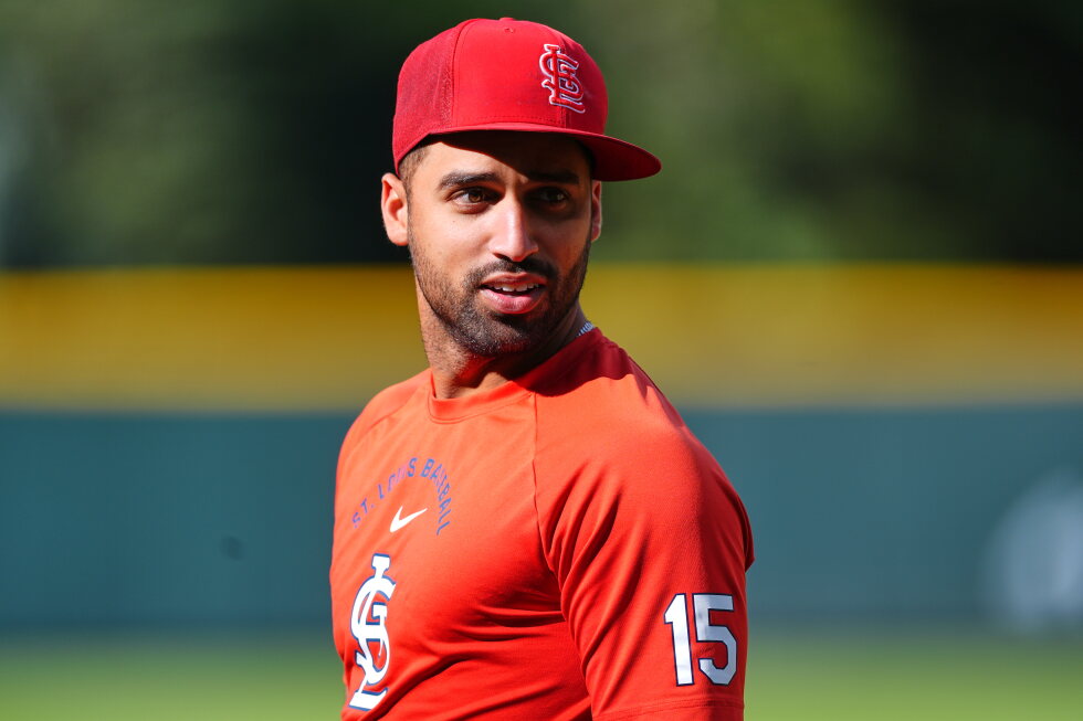 Associated Press image for Cardinals, Rockies players tilt caps a day after umpire Eddings' comments to St. Louis rookie - AP News