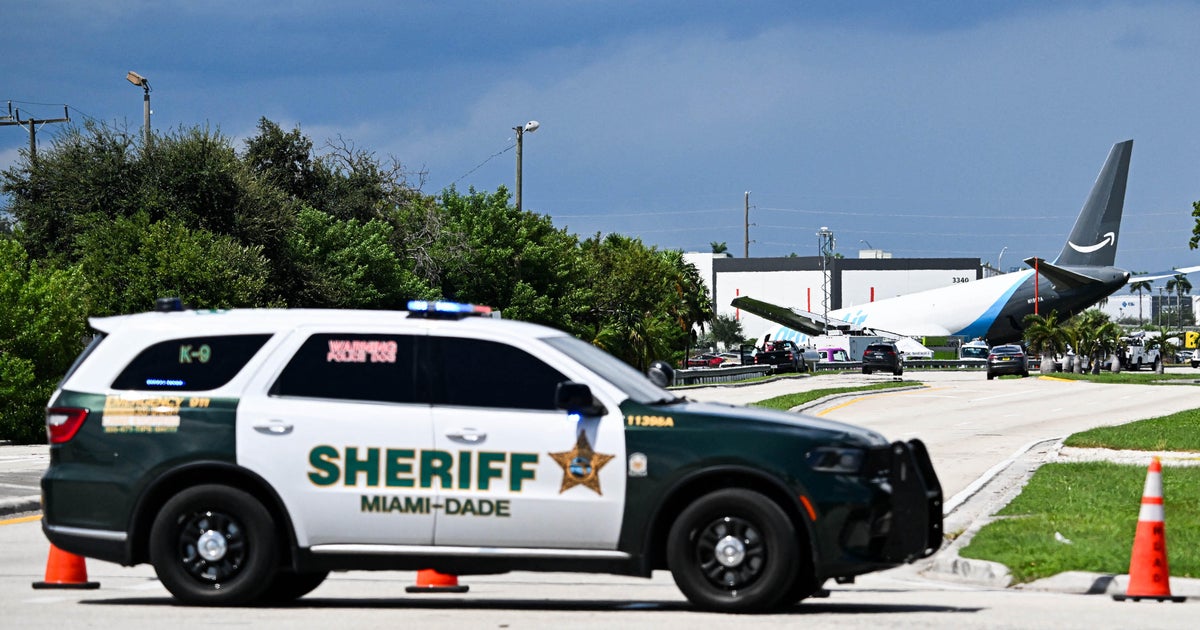 CBS News image for Amazon plane crash victims identified as NTSB investigates cause of deadly incident at Miami International Airport - CBS News