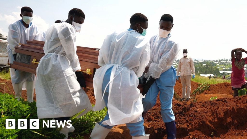 BBC News image for 'I buried my parents one day after the other' - Ebola mourners learn how to grieve safely - BBC