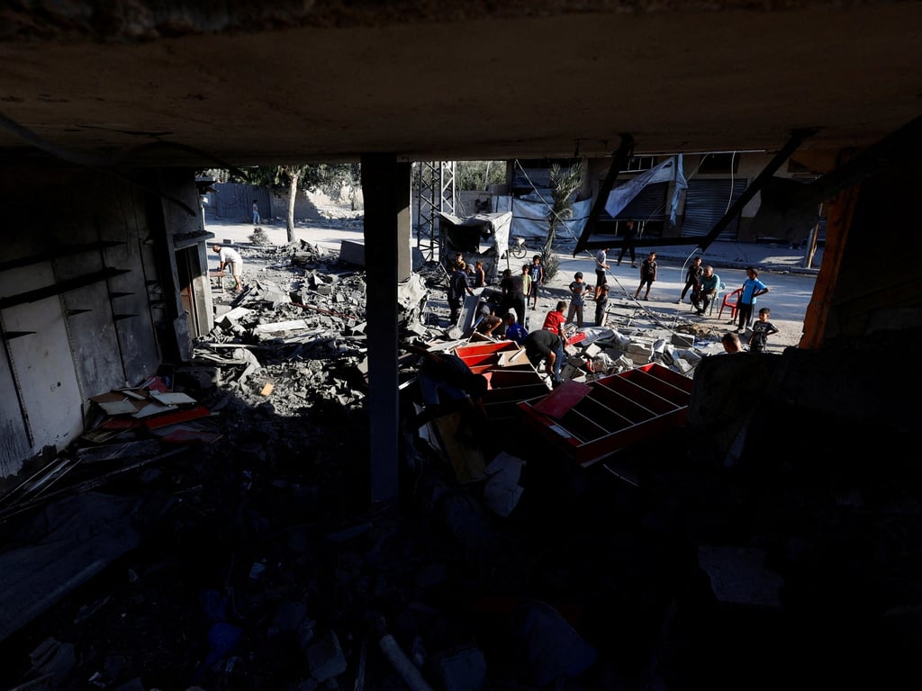 Al Jazeera English image for Israeli attacks on Gaza kill 14, including mourners attending funeral - Al Jazeera