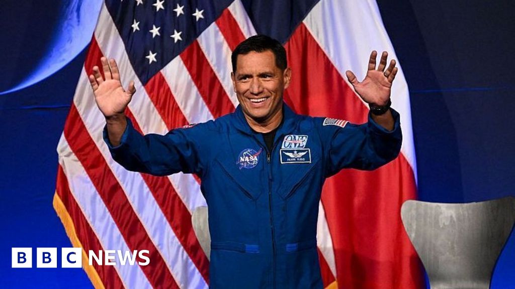 BBC News image for Pupils who designed a badge sent to space meet NASA astronaut - BBC