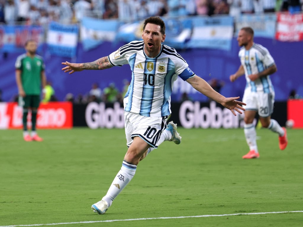 Al Jazeera English image for Messi hat-trick fires holders Argentina to win over Algeria at World Cup - Al Jazeera