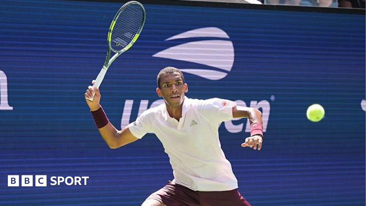 BBC News image for US Open: Felix Auger-Aliassime beaten by Karen Khachanov in second round - BBC