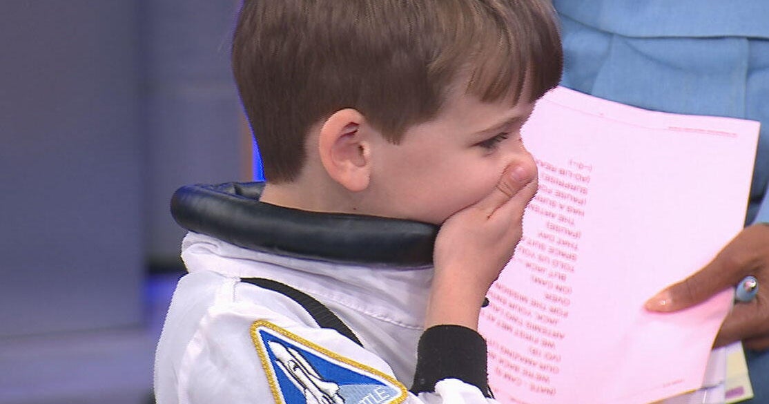 CBS News image for Artemis II crew gives 5-year-old aspiring astronaut Commander Jack a new spacesuit: "It says NASA!" - CBS News
