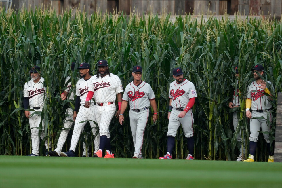 Associated Press image for Field of Dreams becomes the Hall of Fame, as 26 members come out of the corn for Phillies-Twins game - apnews.com