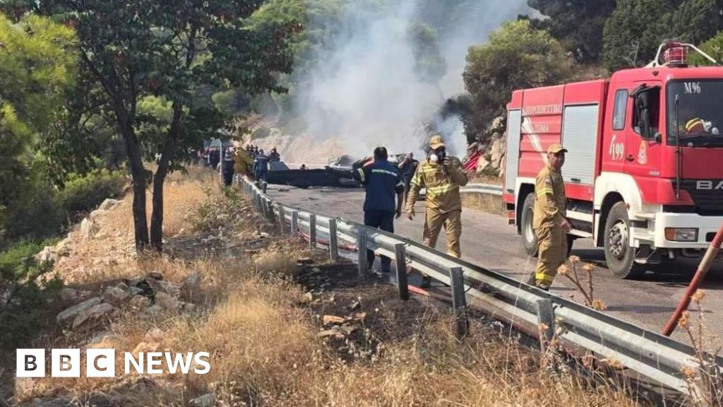 BBC News image for Two crew killed as British pilot survives after firefighting helicopters collide in Greece - BBC