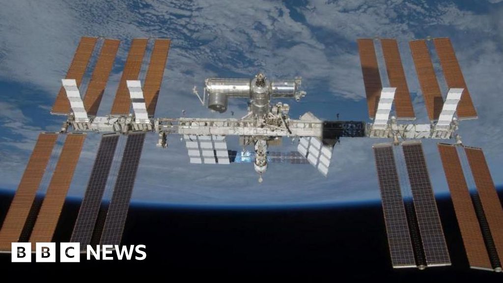 BBC News image for Nasa tells ISS astronauts to shelter during air leak repair attempt - BBC
