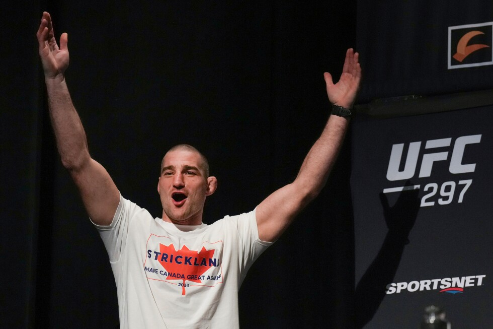 Associated Press image for UFC 328 goes on without Trump, Van defends 125-pound crown, Strickland wins middleweight title - AP News