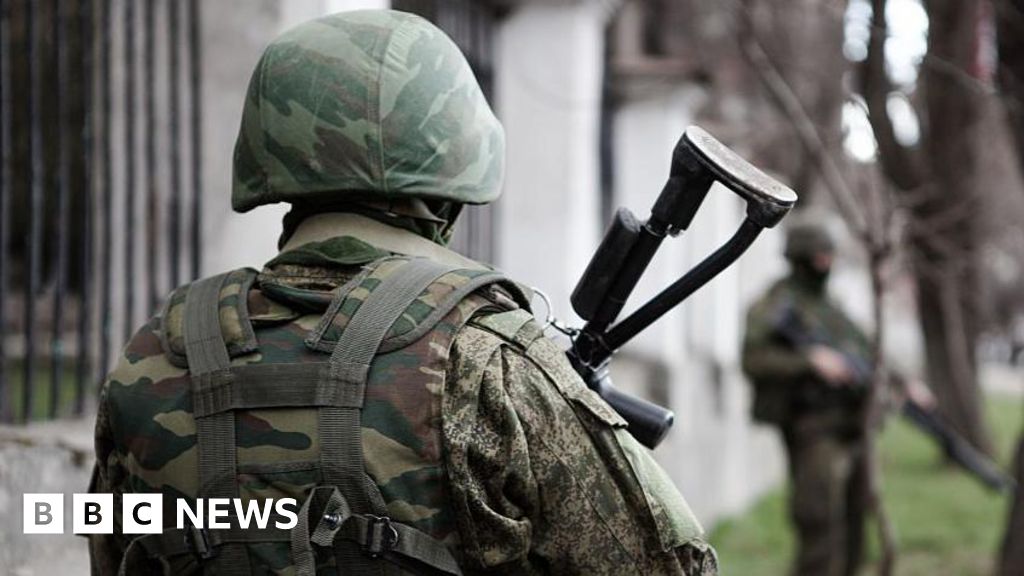 BBC News image for Soldier kills four in gun rampage in Russian-occupied Crimea - BBC