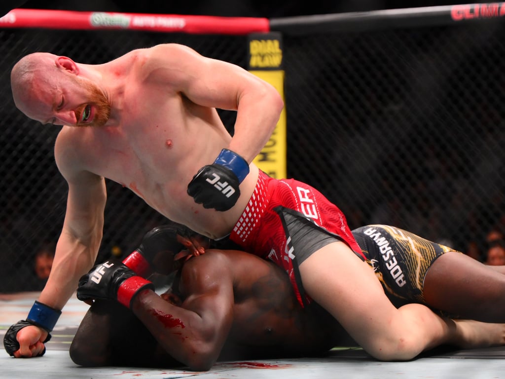 Al Jazeera English image for Israel Adesanya knocked out by Joe Pyfer at UFC Fight Night in Seattle - Al Jazeera