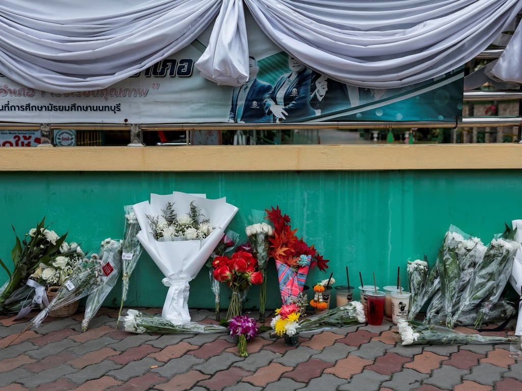 Al Jazeera English image for Families retrieve bodies after deadly shooting rampage outside Bangkok - Al Jazeera