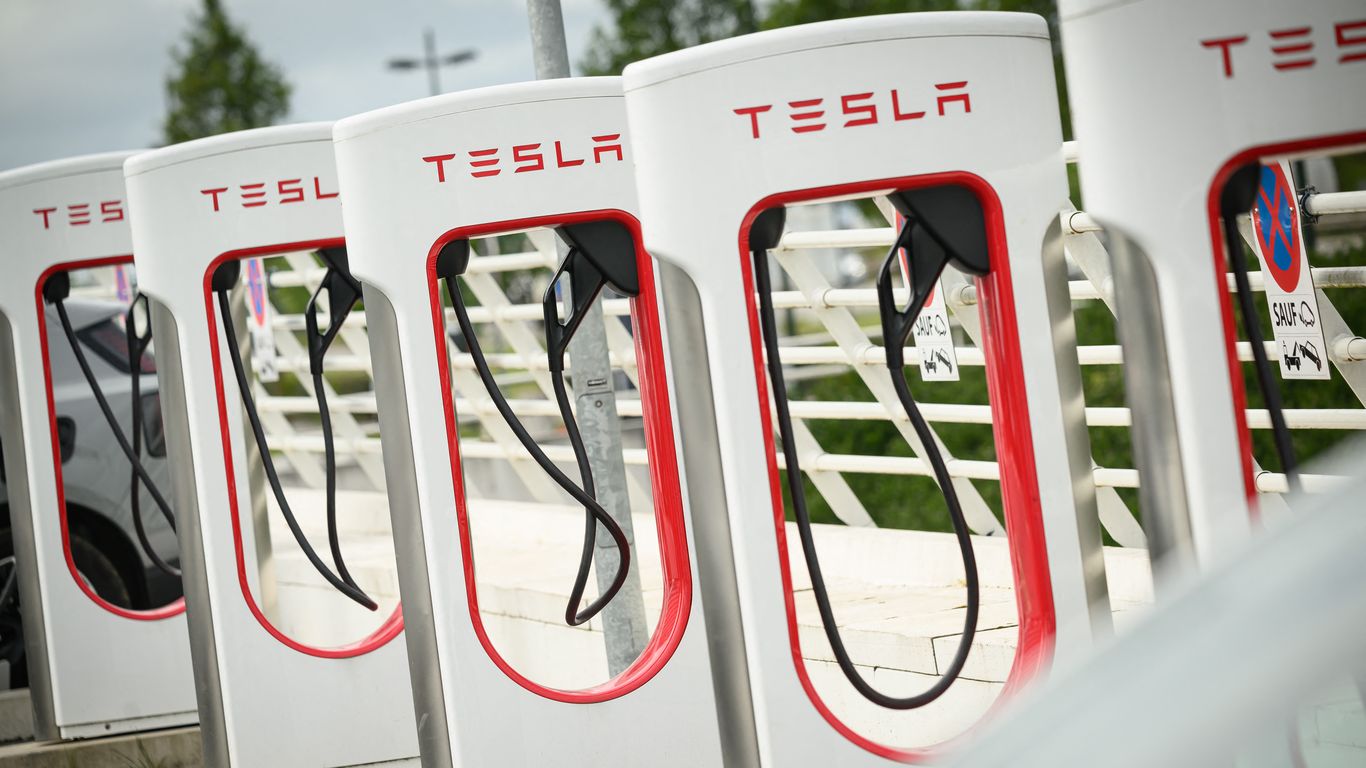 Axios image for Tesla earnings rise, but AI expenses add up for Elon Musk - Axios