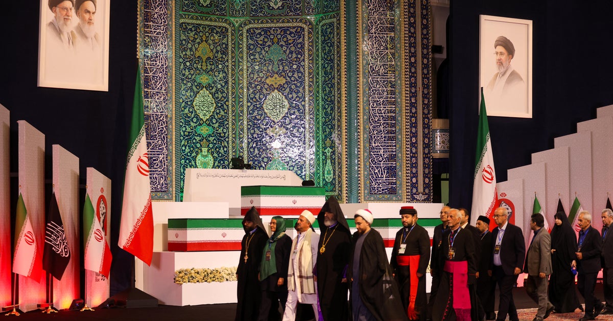 CBS News image for U.S.-Iran Latest: Slain supreme leader's coffin on display as Iran gears up for dayslong funeral, with peace talks paused - CBS News
