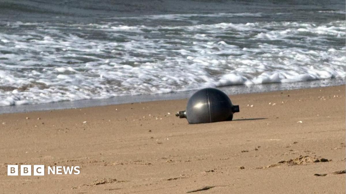 BBC News image for Australia probes mystery space balls that washed up on beach