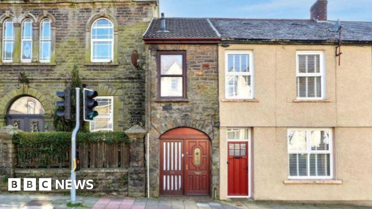 BBC News image for Super-slim Treorchy house goes under the hammer for under £45,000