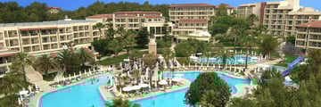 Aerial view of hotel with pool