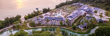 Aerial view of a resort with the beach to the left