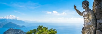 Statue in front of beautiful views