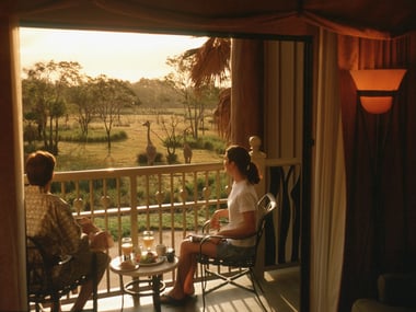 Disney Animal Kingdom Lodge guests looking at Savanna from their balcony