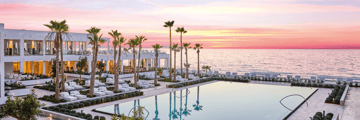 Sunset views from the pool at the Grecotel LUX ME White Palace