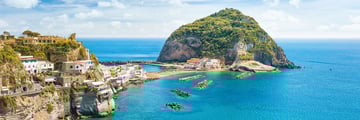 Island surrounded by turquoise water