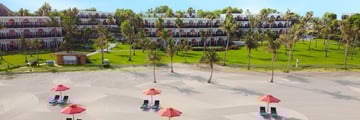 The beach at JA Palm Tree Court