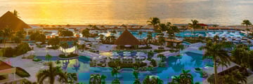 Aerial view of pool area at sunset