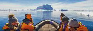 Zodiac boat with passengers in Antarctica