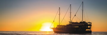 Boat on the water at sunset