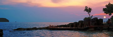 Six Senses Krabey Island boardwalk at sunset