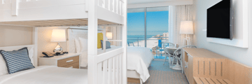 Deluxe King room with bunk beds and Gulf view