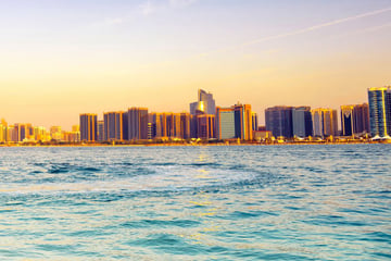 Abu Dhabi skyline at sunset