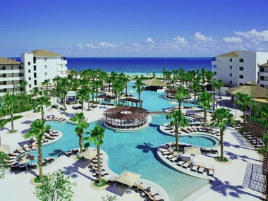 Aerial view of the pools at Secrets Playa Mujeres Golf & Spa Resort