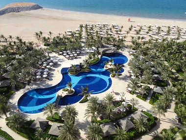 Aerial view of pool and beach, Waldorf Ras Al Khaimah