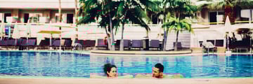 Couple in pool at Arona Gran Hotel