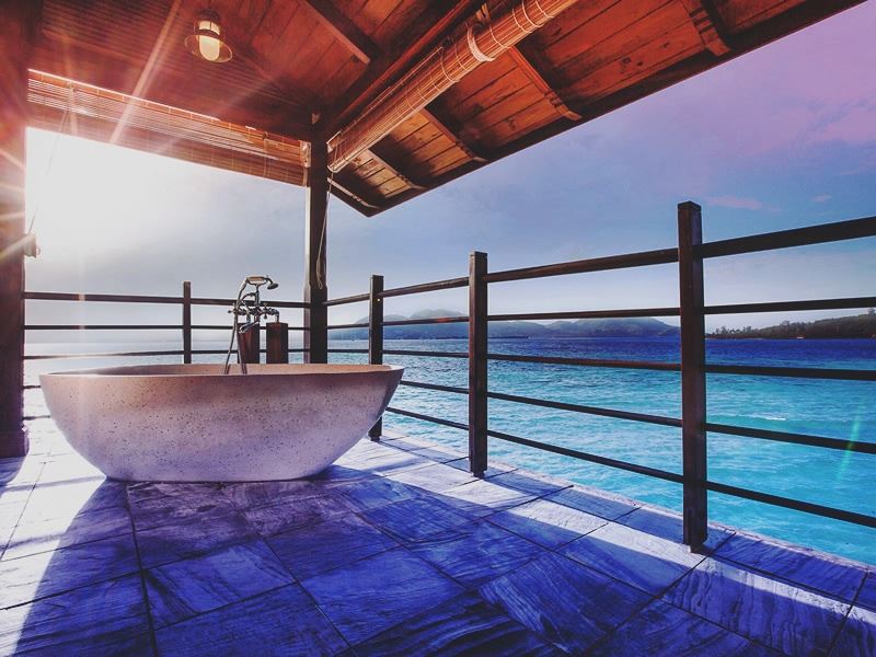 A bath with a view at Enchanted Island Resort, Seychelles