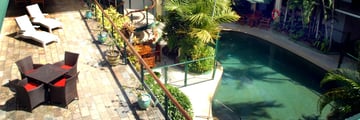 Balcony and Pool at Bay Village Tropical Retreat