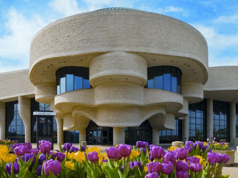 canadian museum of history building with bright tulips outside