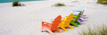 Rainbow sun loungers along Captiva's beach