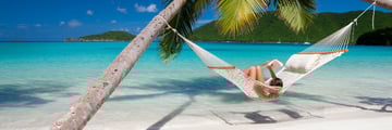 Relaxing and reading a book in the Caribbean