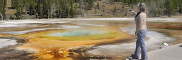 Taking photos at Yellowstone's chromatic pool