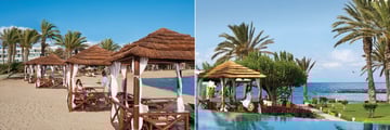 Beach cabanas and pool at Constantinou Bros Asimina Suites