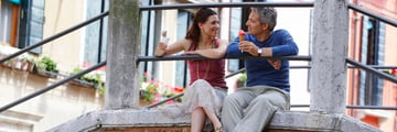 Couple eating gelato together in Venice