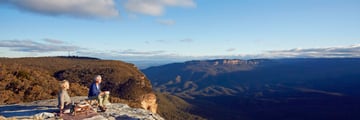 Couple looking out to beautiful vistas in Australia